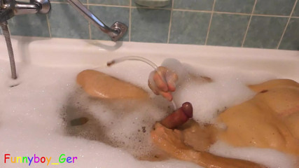 Shaving, cock play and cumming with a limp cock in the bathtub