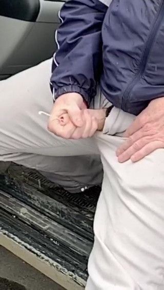 Uncut cumshot outdoors in slow motion