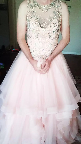 Wearing and enjoying a gorgeous pink quinceanera gown