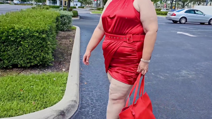 Beautiful Woman Walking Outdoors in  Parking Lot Showing off for Strangers