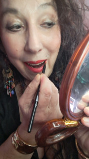 Why do women put on lipstick?