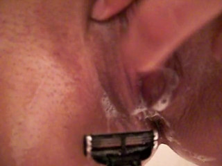 young college Latina shaving her pussy POV