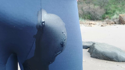 Wetting blue leggings outdoors