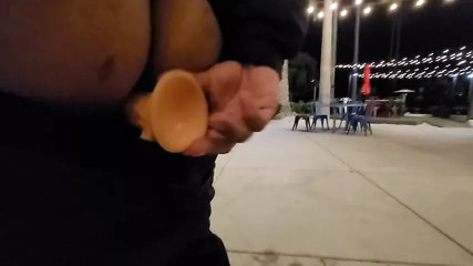 Risky public outdoor anal dildo