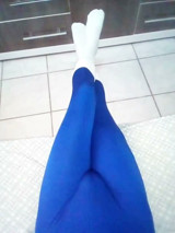 Fun at home wearing a blue Zentai costume with socks