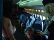 Horny air hostesses fuck in an empty plane