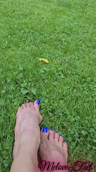 Melove Blue Nail Polish Showing her sexy feet on Grass