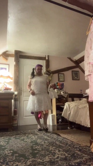 Dressed with a white lace dress for a night out
