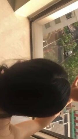 Chinese wife in home