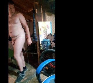 All naked inside a wooden house