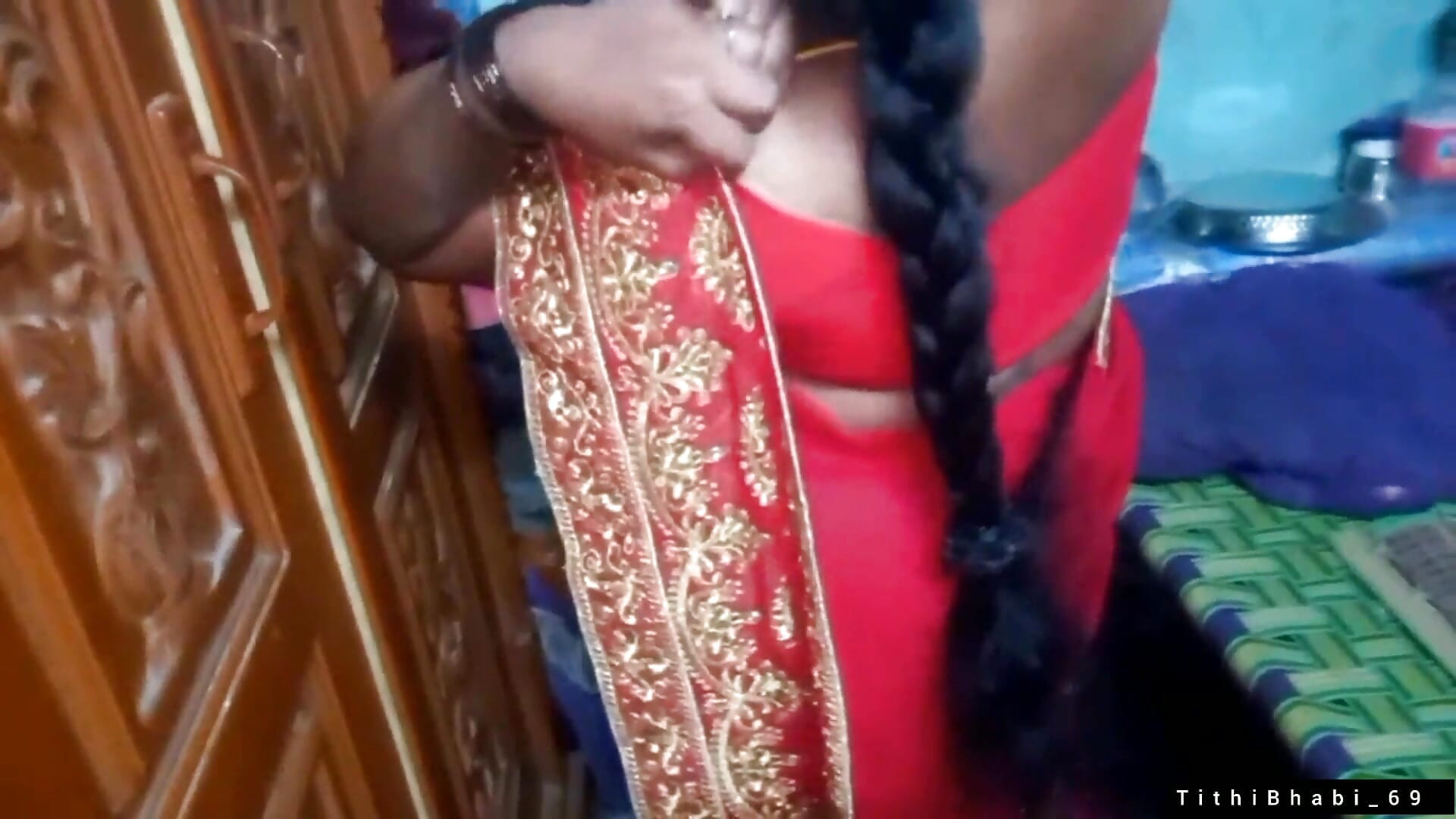 Desi Bhabi Changing Her Red Shari .