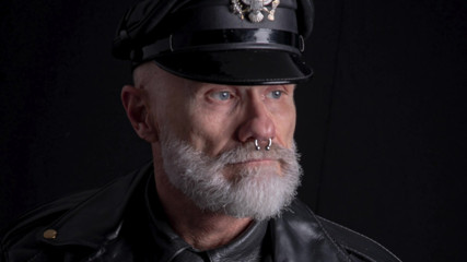 Leather Stepdad Lighting a Big Ring