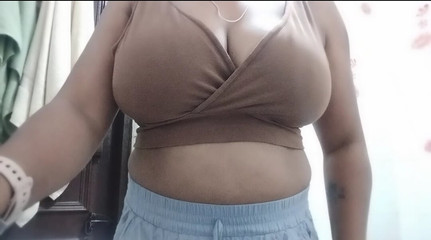 Desi Mona bhabhi is pressing Dudu in the bathroom.